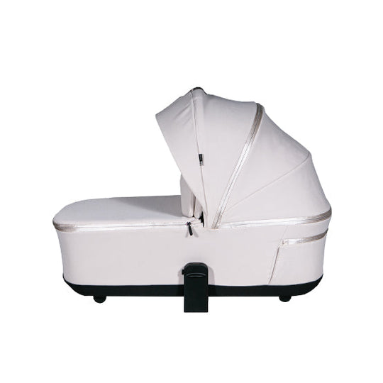 Beige Lunar II carry cot with canopy and UPF50+ protection.