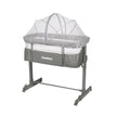 Grey Next to Me Cot with adjustable features for co-sleeping or stand-alone use, perfect for babies from birth to 6 months.