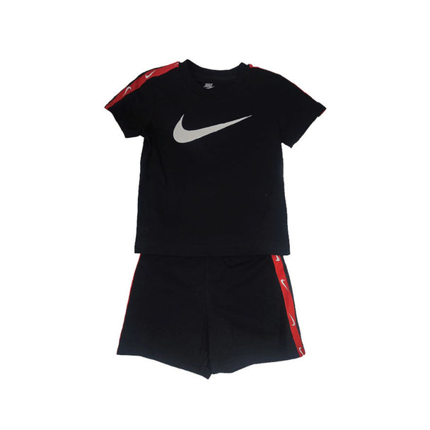 Nike Kids Club Poly FT Short Set in black with graphic print and red accents.